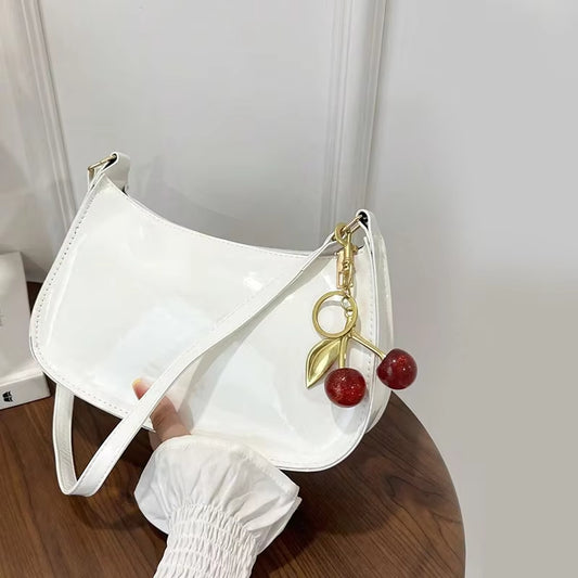 Women's PU Leather Handbag Versatile Fashion Solid Color Cherry Pendant Shoulder Bag