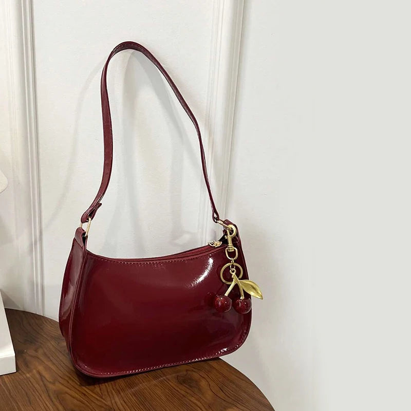 Women's PU Leather Handbag Versatile Fashion Solid Color Cherry Pendant Shoulder Bag