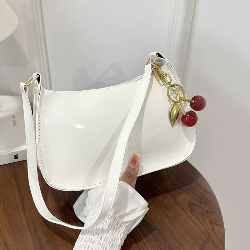 Women's PU Leather Handbag Versatile Fashion Solid Color Cherry Pendant Shoulder Bag