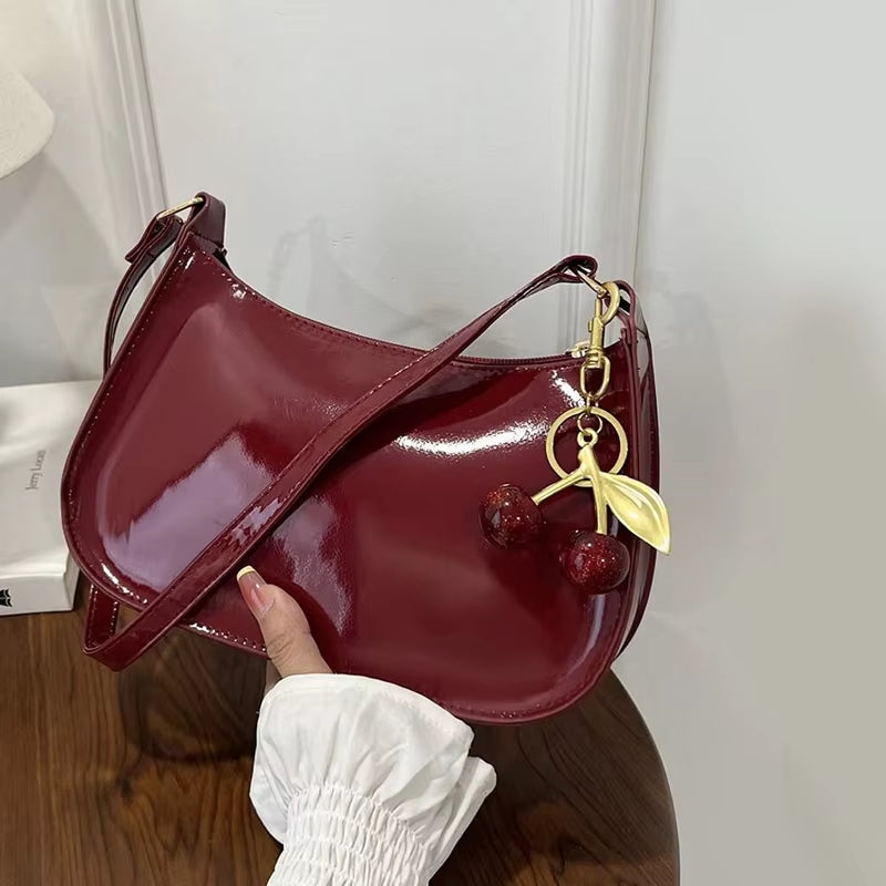 Women's PU Leather Handbag Versatile Fashion Solid Color Cherry Pendant Shoulder Bag